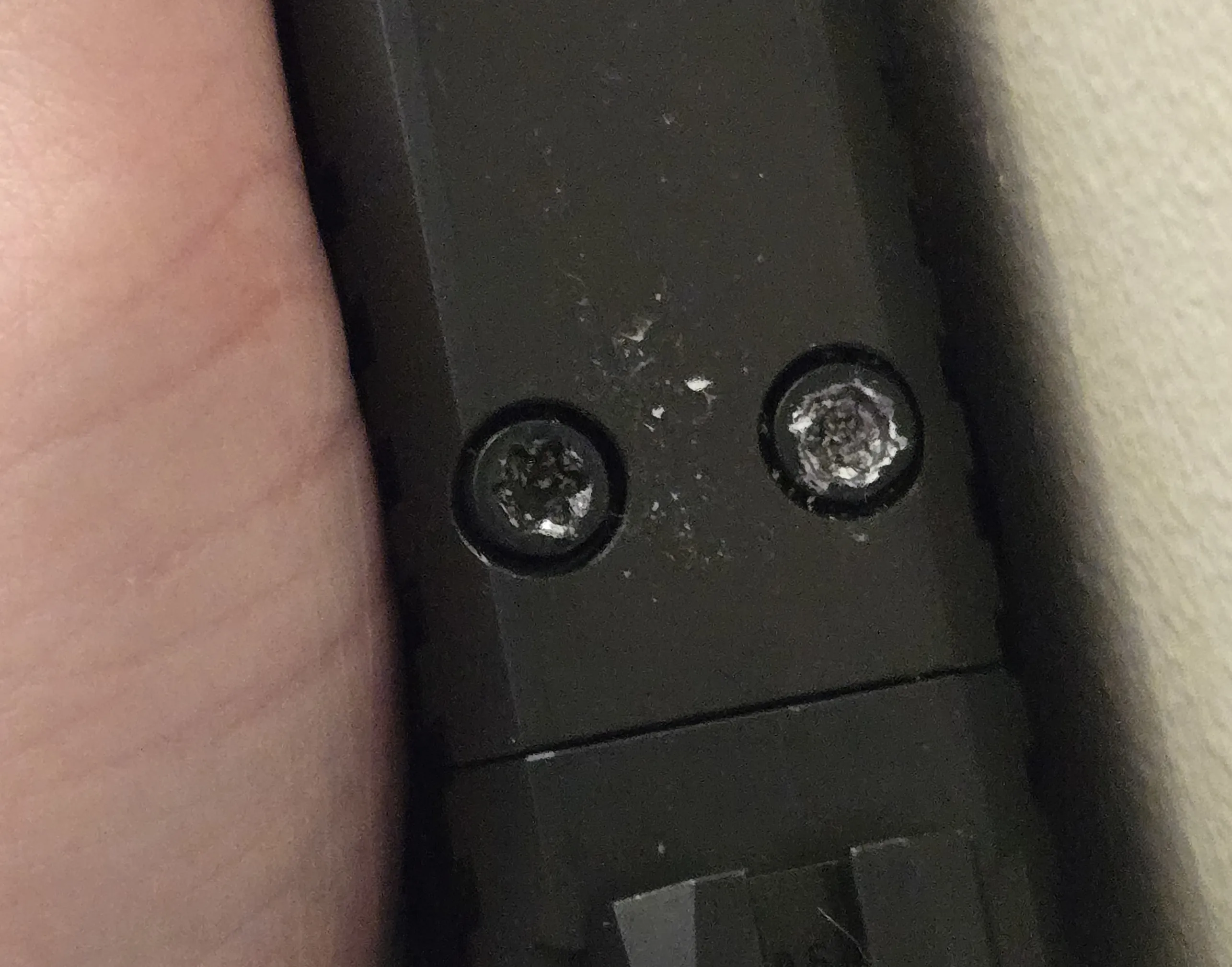 A photo of a CZ P-09F Nocturne with a stripped optics plate screw